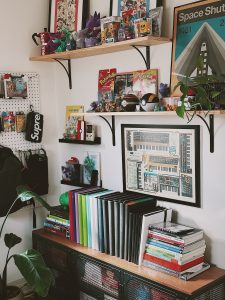 a bunch of books that are on a shelf